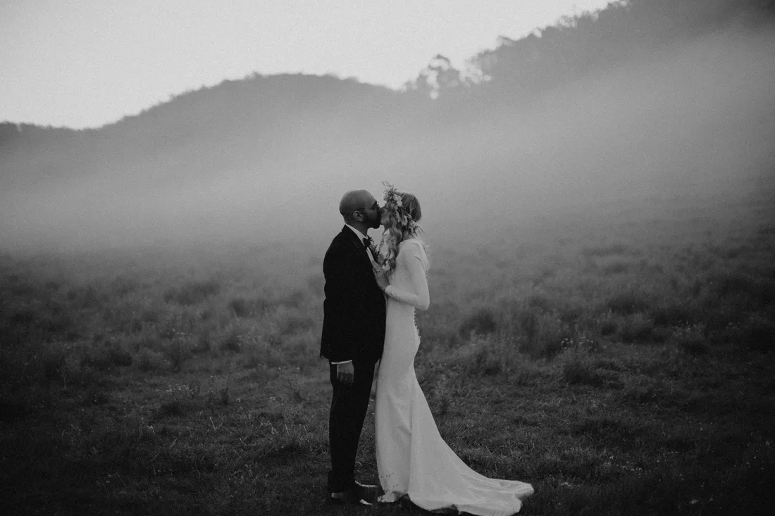 Black and white portrait of a couple in mist